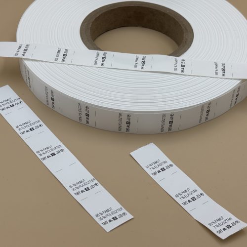 Bérnyomtatás  - TEXTIL bevarrható műanyag címkére - POLYESTER - MOSÁS TÁJÉKOZTATÓ